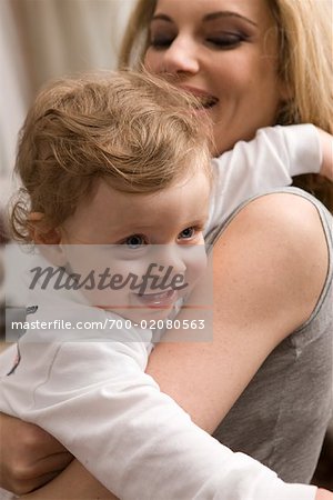 Woman Holding Toddler