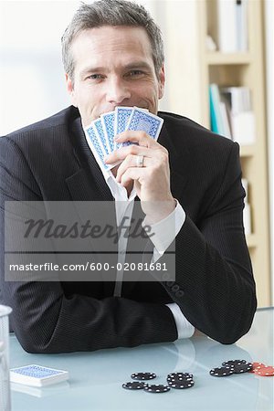 Businessman Playing Poker