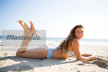 Woman Lying on the Beach, Newport Beach, Orange County, Southern California, California, USA