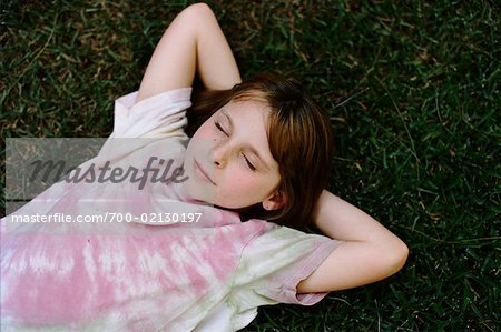 Girl Lying in Grass