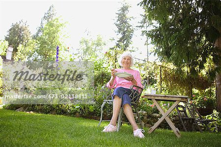 Senior woman eating a healthy salad