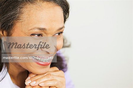 A middle-aged woman with braces