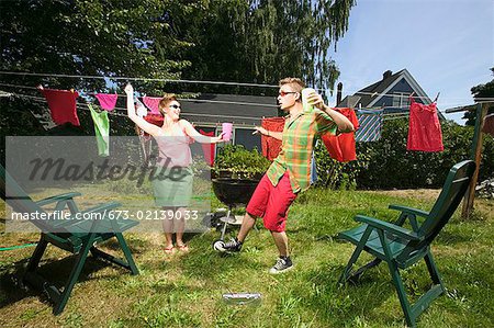 Couple dancing in backyard