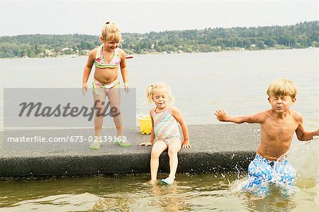 Kids playing on a raft