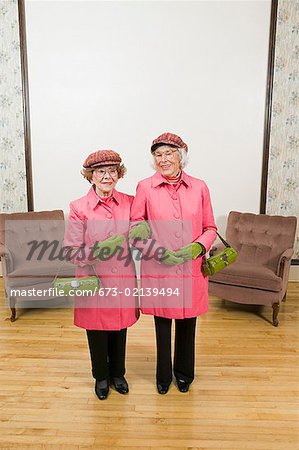 Senior women dressed alike