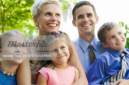 Portrait of family with three children