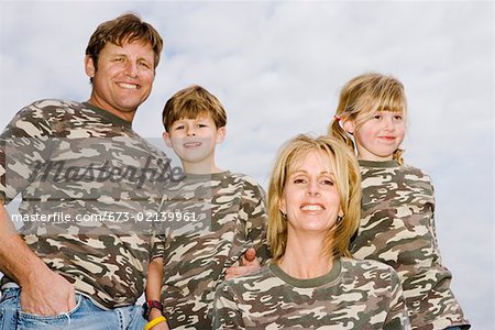 Portrait of family in camouflage shirts