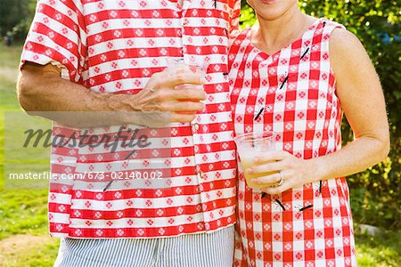 Couple with matching silly picnic clothing
