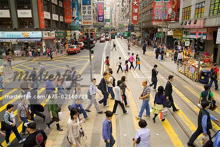 Crowded crosswalk on Hong Kong street