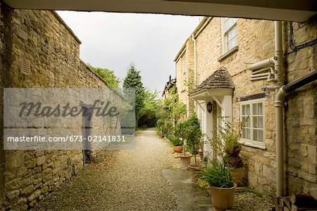 Stone cottages and wall, Cotswolds, United Kingdom