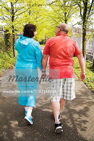 Couple walking together outside