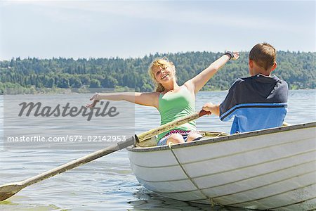 Boy and girl in row boat