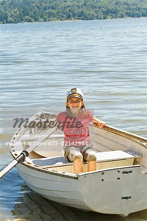 Young girl in row boat