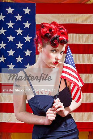 Woman in front of American flag