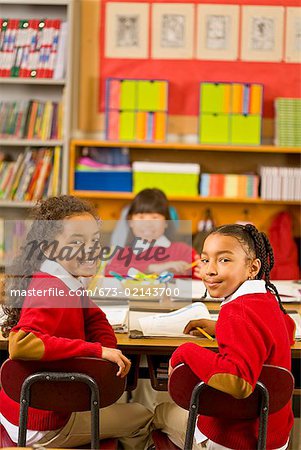 Multi-ethnic girls in classroom