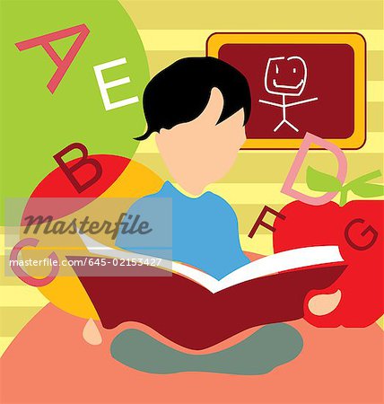 Front view of a boy studying book