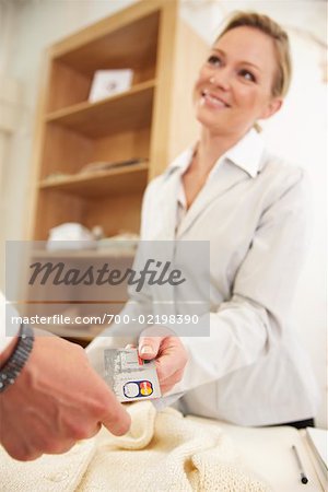 Woman Paying for Purchase in Store