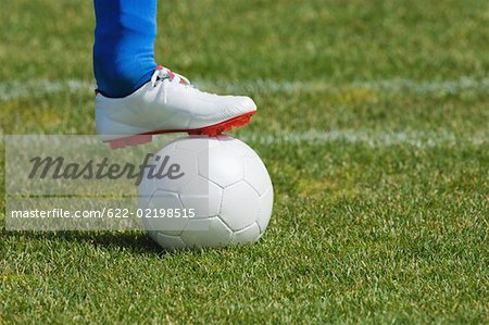 Ballon de soccer Player Holding