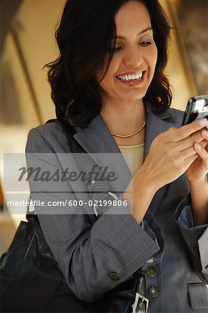 Businesswoman using Cell Phone