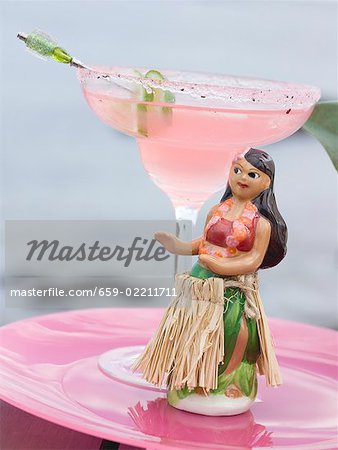 Pink cocktail with Hawaiian dancing girl