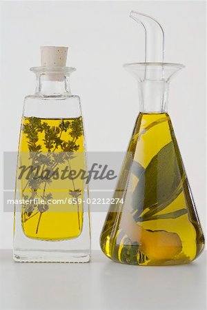 Two different herb oils in bottles