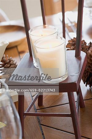 Christmas table decoration: candles on small chair