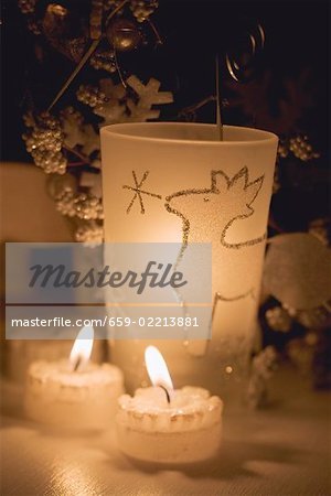 Two tealights and windlight with reindeer design
