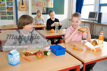 Children Eating Lunch in Classroom