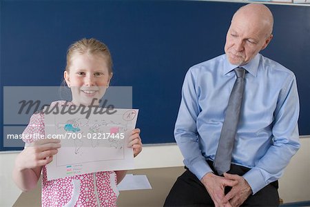 Successful Geography Student with Teacher