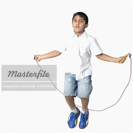 Portrait of a boy skipping