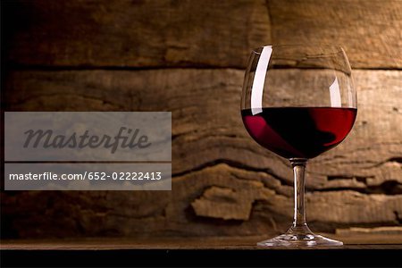 Glass of red wine in the cellar