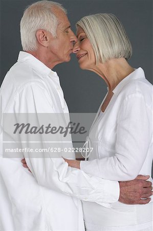 Kissing old couple