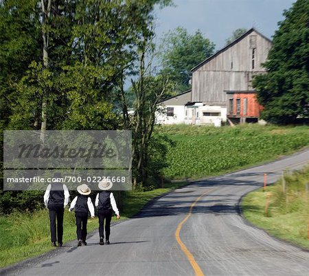 Amish Kids Walking Down Country Road, Rebersburg, Pennsylvania, USA
