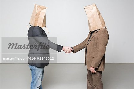 Men with paper bags on their heads