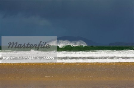 Portsalon, County Donegal, Ireland; Wave breaking on shore