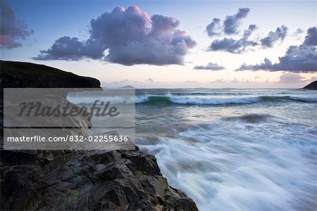 Dunfanaghy, County Donegal, Ireland; Waves crashing on rocky seashore