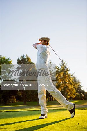 Golfer Driving Ball, Salem, Oregon, USA