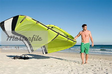 Man with kiteboard