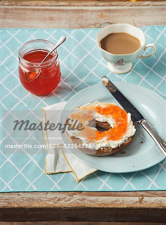 Cup of Tea and Red Pepper Jelly and Cream Cheese on Bagel