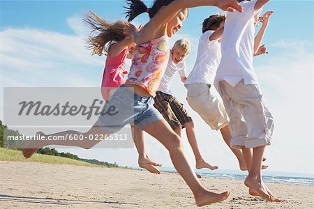 Kids Running and Playing on the Beach, Elmvale, Ontario, Canada