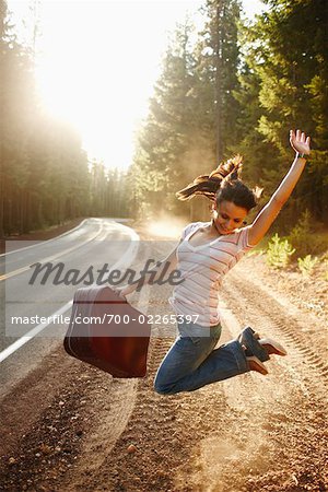 Girl Dancing on Side of Road, Pacific Coast Highway, California, USA