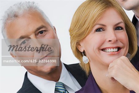 Portrait of a businessman and a businesswoman smiling