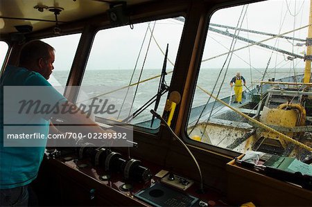 Skipper in Cabin on Mussel Ship, Friesland, Netherlands