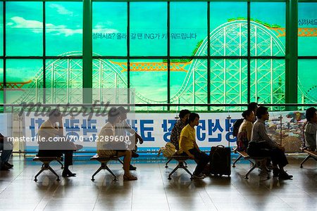 Commuters at Seoul Station, Seoul, South Korea