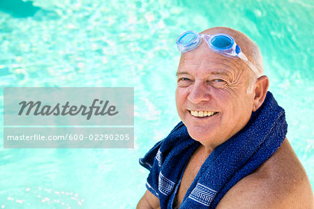 Portrait of Man With Towel Around His Shoulders, Wearing Goggles