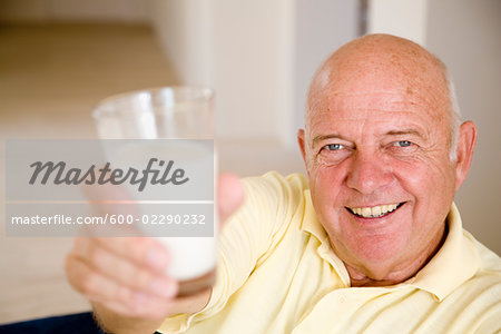 Man Drinking Glass of Milk