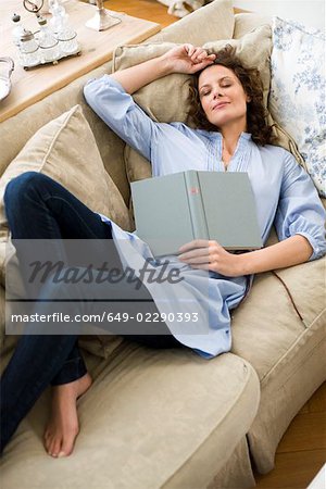 Woman sleeping on a couch
