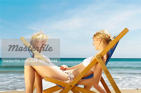 Young couple sitting in sun