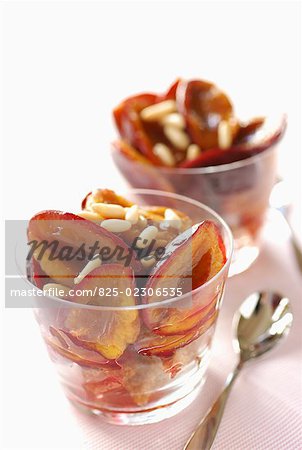 plums with maple syrup and pine seeds