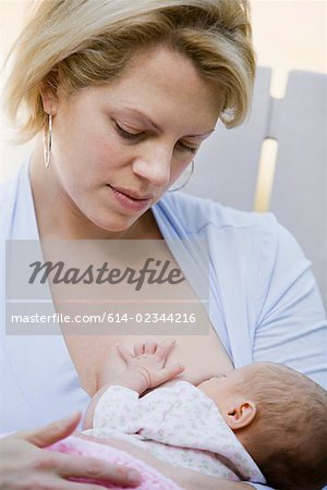 A mother breastfeeding her baby